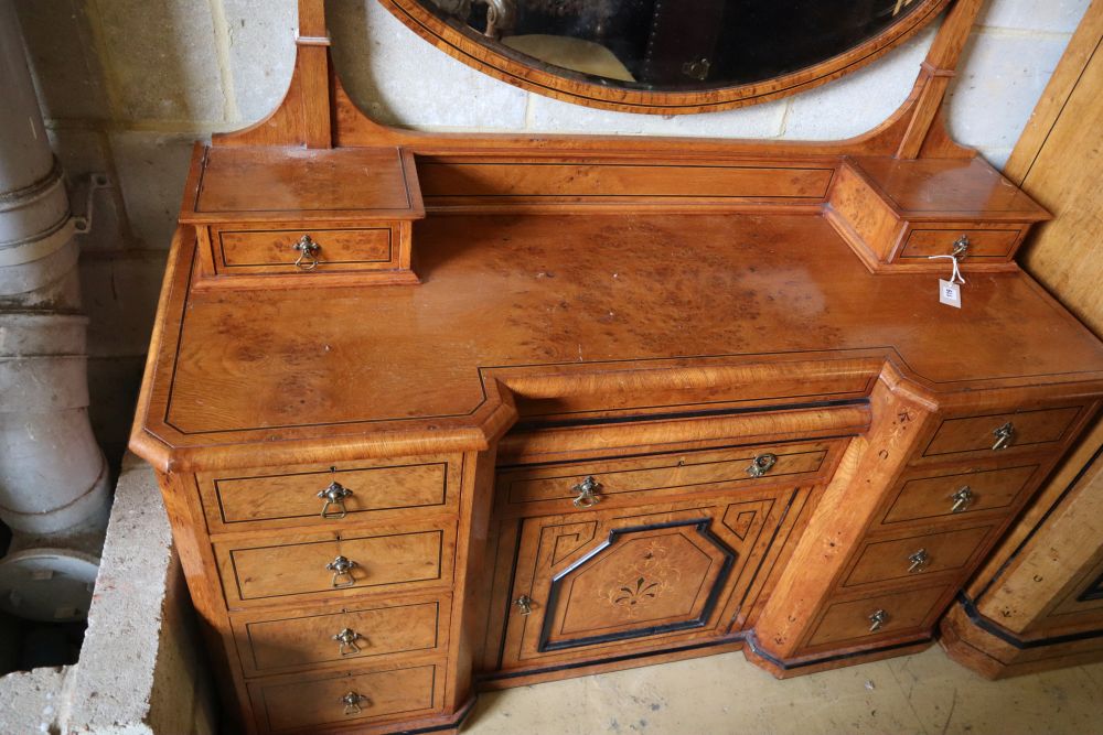 A late Victorian inlaid burr and pollard oak inverse breakfront dressing chest, width 146cm depth 56cm height 178cm